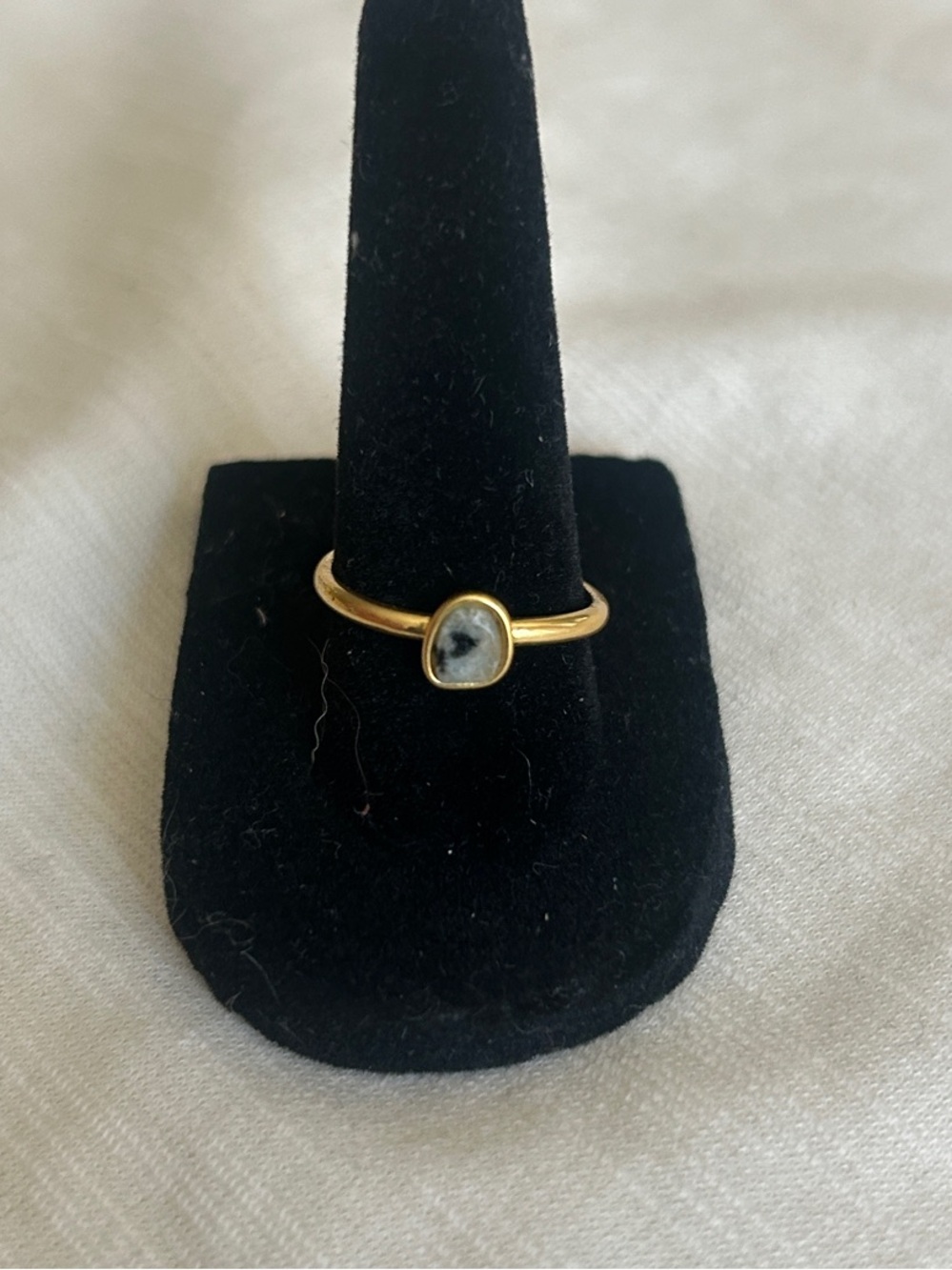 Gold Ring with Small White and Black Stone